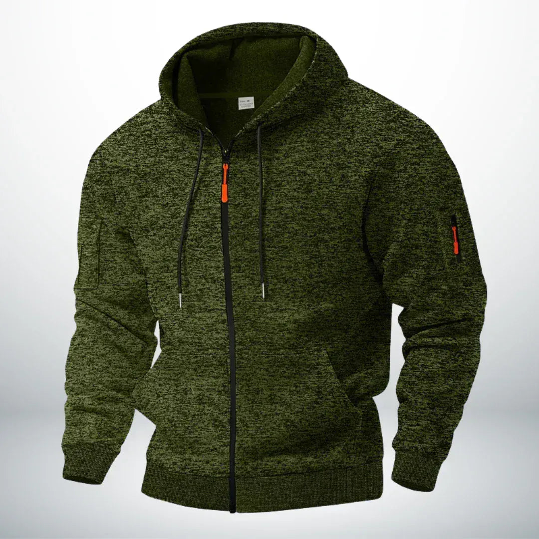 Detail van de praktische ritszak op de mouw van de Sebastiaan hoodie, ideaal voor sleutels of een pasje.