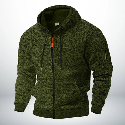 Detail van de praktische ritszak op de mouw van de Sebastiaan hoodie, ideaal voor sleutels of een pasje.