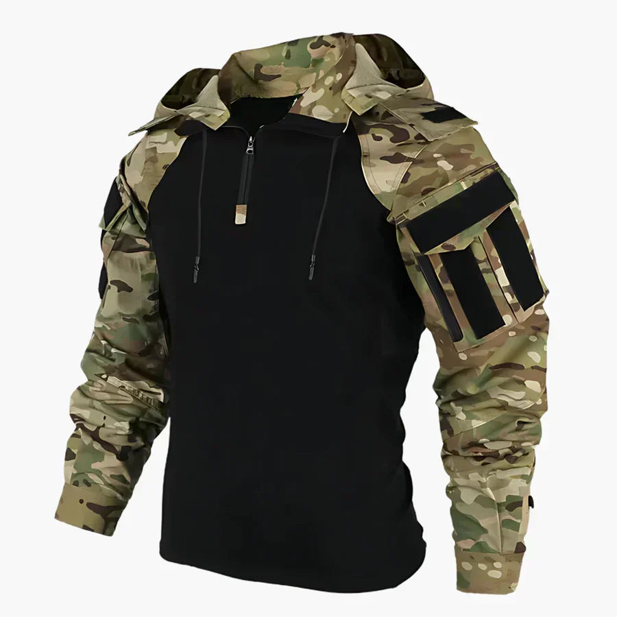Detailopname van de waterafstotende diagonale structuur van de Arne hoodie, met focus op de stof en de afwerking van de mouw.