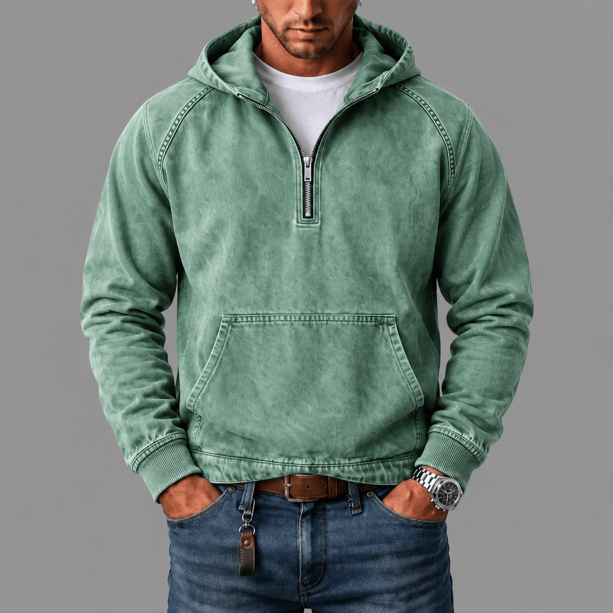 Stapel opgevouwen Dion hoodies in verschillende kleuren, toont de variëteit van de collectie.