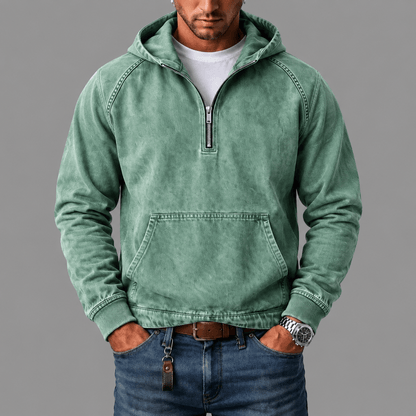 Stapel opgevouwen Dion hoodies in verschillende kleuren, toont de variëteit van de collectie.