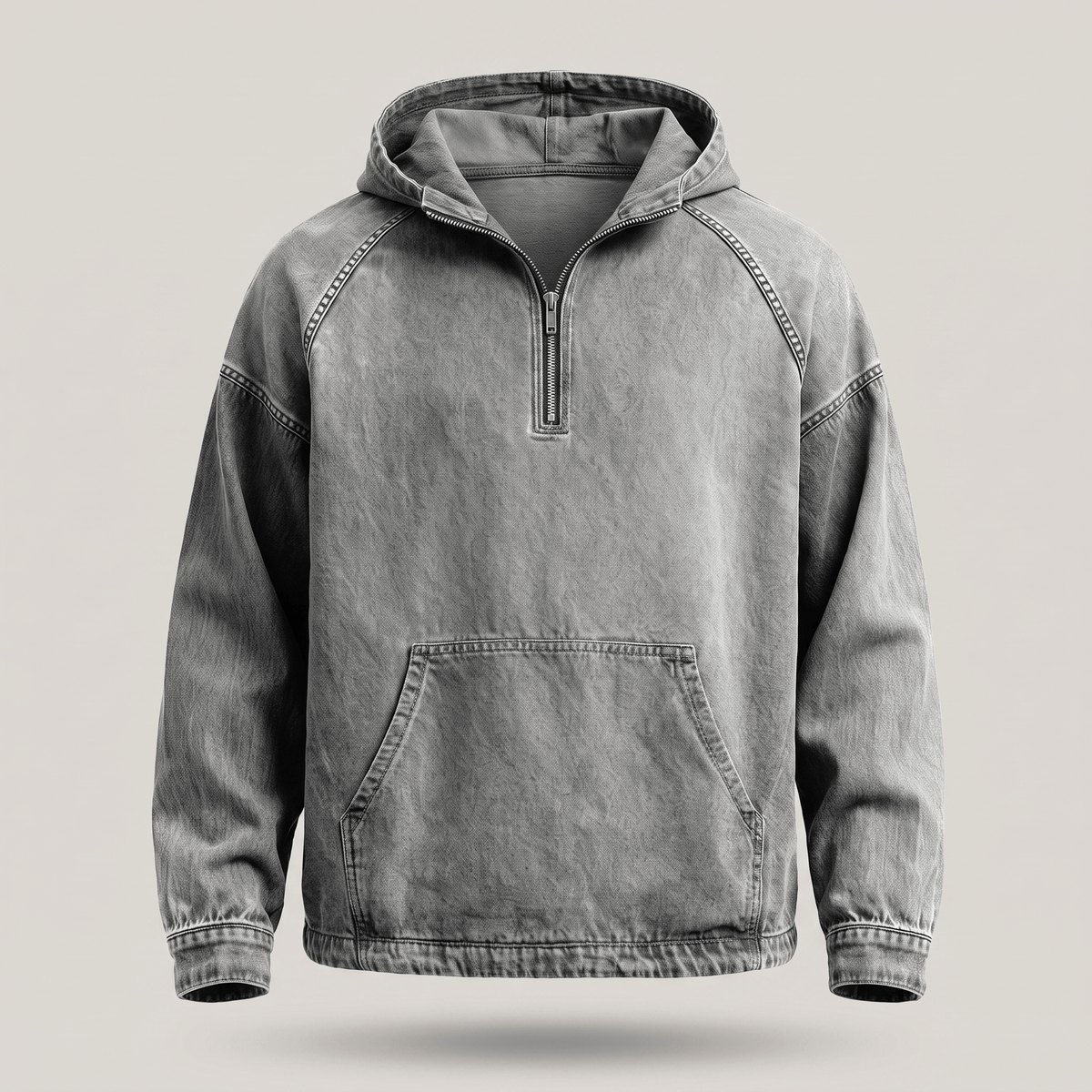 Model toont de Dion denim hoodie in zwart, met handen in de kangoeroezak, voor een relaxte pose.