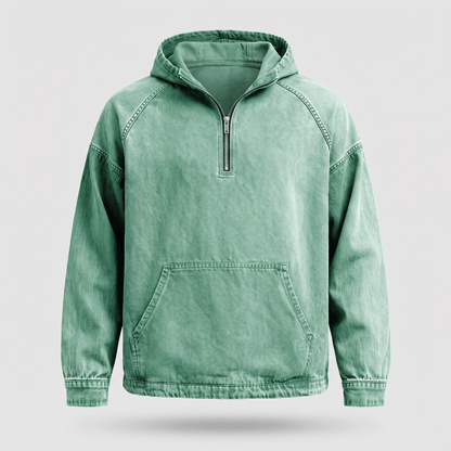 Close-up van de metalen halve ritssluiting op de borst van de Dion denim hoodie, in detail.
