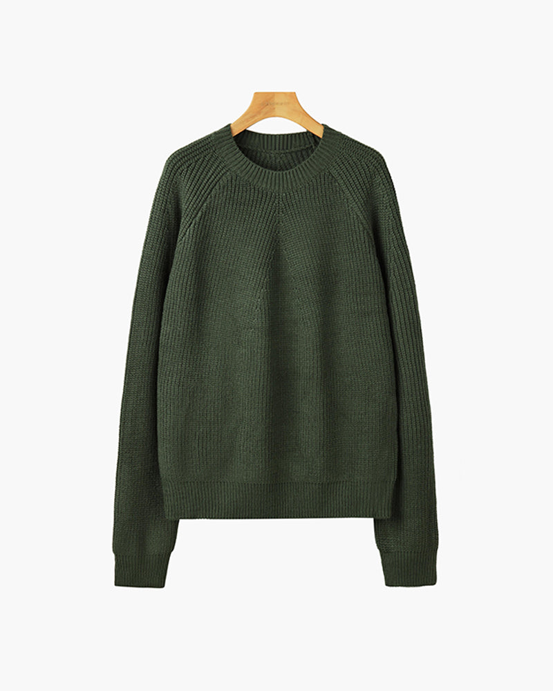 Zijaanzicht van de comfortabele katoenen sweater, toont de relaxed fit en geribbelde zoom.