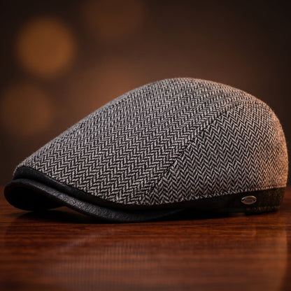 Close-up van de stoffen textuur van de Caspar Ivy Cap, waarbij de fijne weving en duurzaamheid naar voren komen.