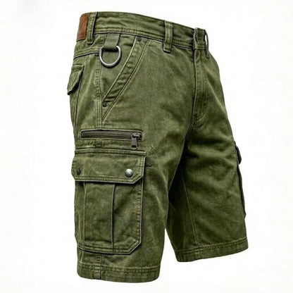 Detailopname van de stof van de Elias denim cargoshorts, toont het ingebroken denim gevoel en de textuur.