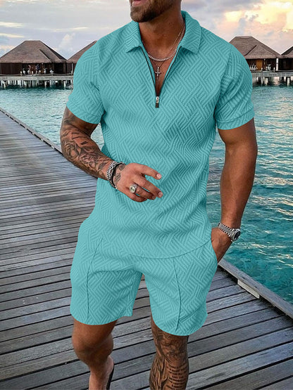 De Enzo kleding set in een donkerblauwe variant, staand model toont de volledige outfit.