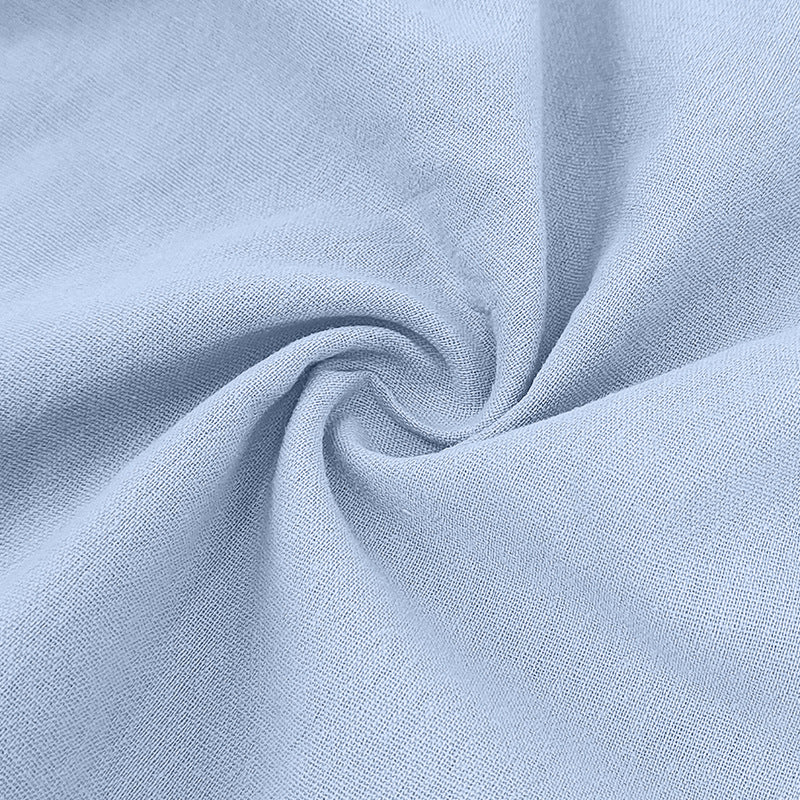 Een gestapelde weergave van alle beschikbare kleuren van het Felix poloshirt, van wit tot marineblauw.
