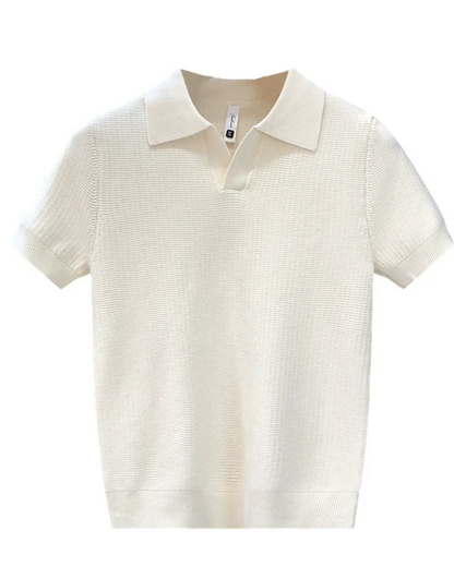 Vooraanzicht van het Jasper ademende gebreide poloshirt in grijs, met klassieke kraag en knoopsluiting.