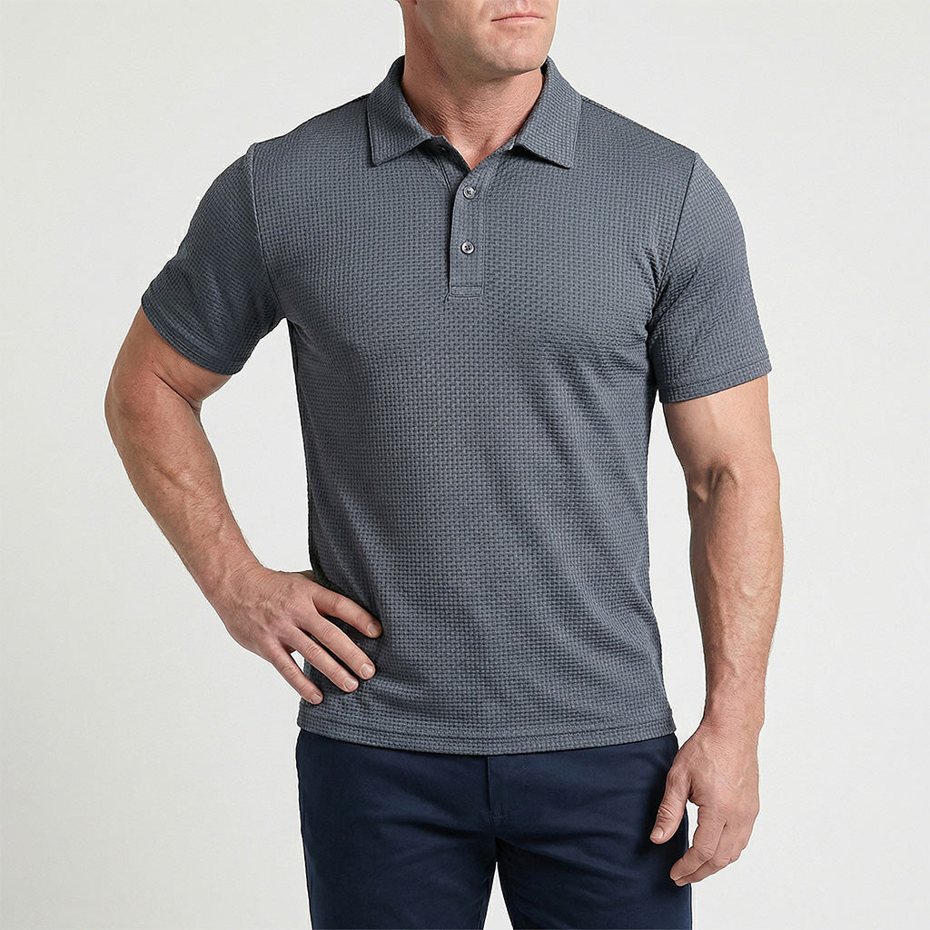 Close-up van de knoopsluiting en het materiaal van het Jorin poloshirt in Grijs