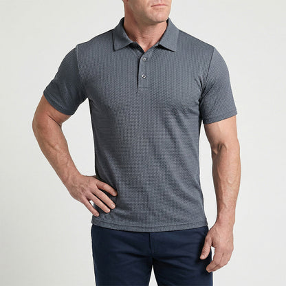 Close-up van de knoopsluiting en het materiaal van het Jorin poloshirt in Grijs