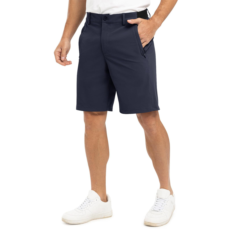 Marineblauwe Levy stretch golfshorts, zijaanzicht dat de pasvorm en de functionele zakken toont.