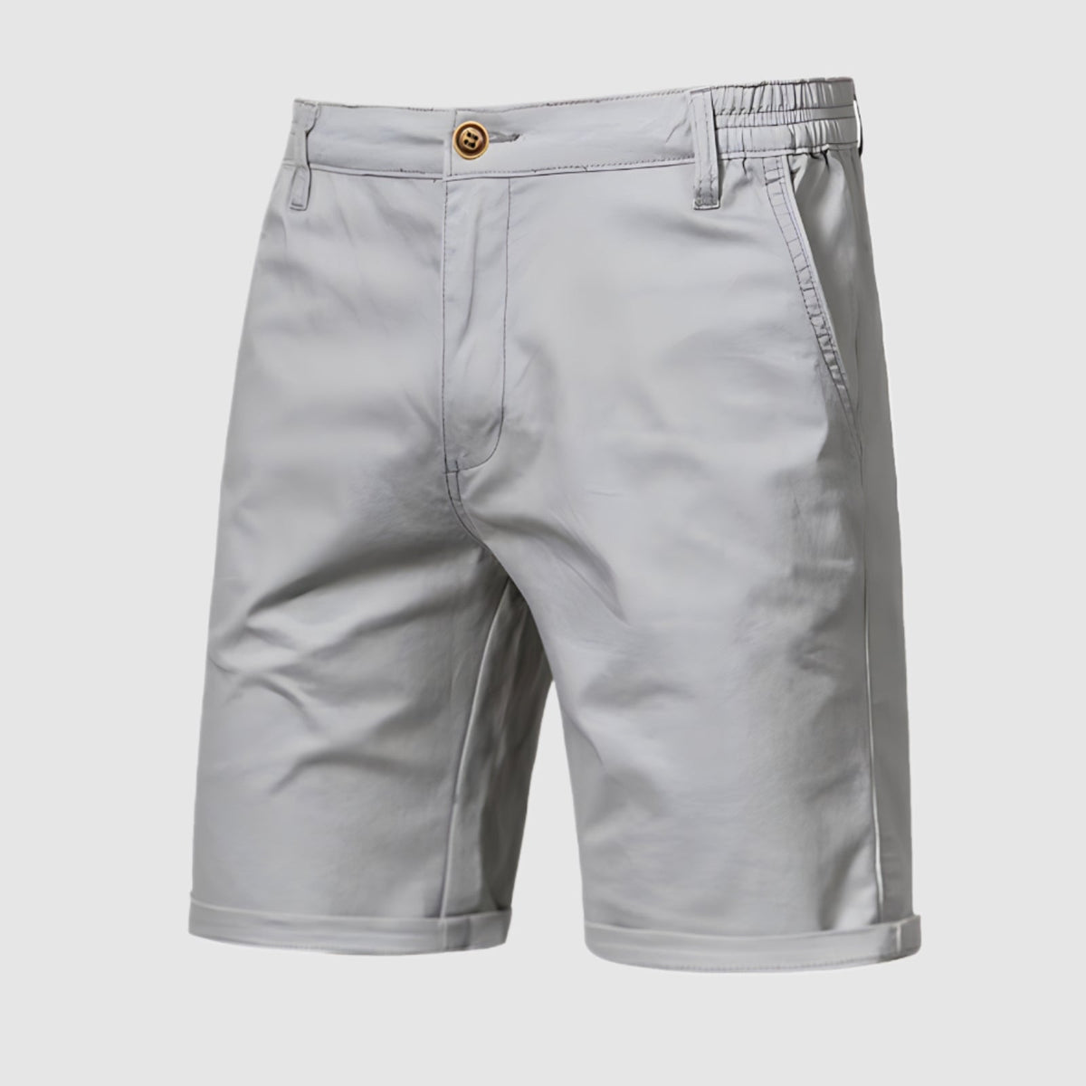 Close-up van de tailleband van de Loris katoenen shorts, met de stevige constructie en riemlussen.