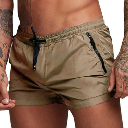 Detailopname van de tailleband van de Max zwemshort, toont de verstelbare trekkoord en de stevige afwerking van deze zwemshort.