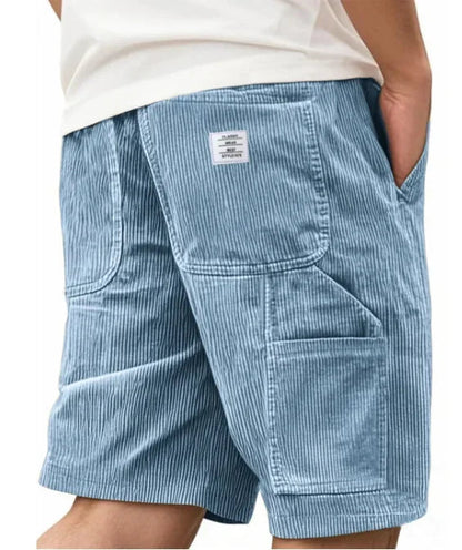 Detail van de tailleband en het trekkoord van de Remi cargoshort in wit, voor een verstelbare pasvorm.