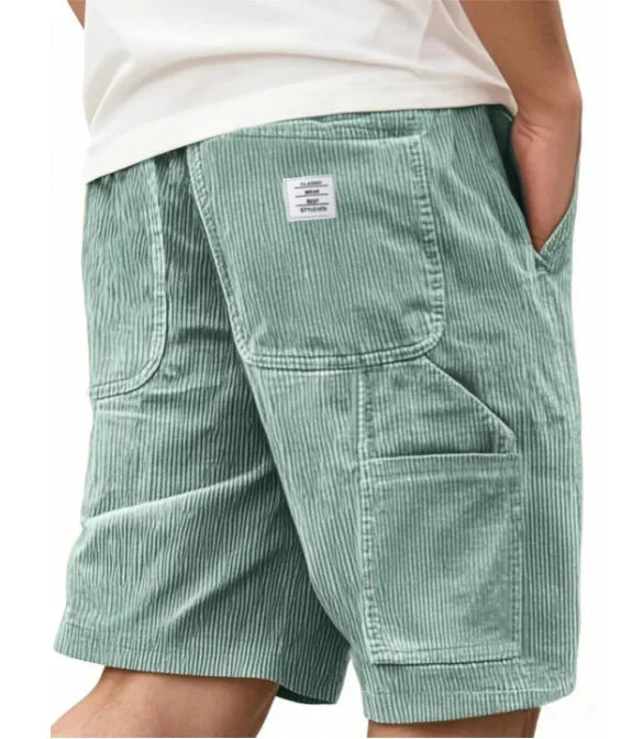 Groep Remi cargoshorts in verschillende kleuren, netjes opgestapeld, toont de brede kleurkeuze voor heren.