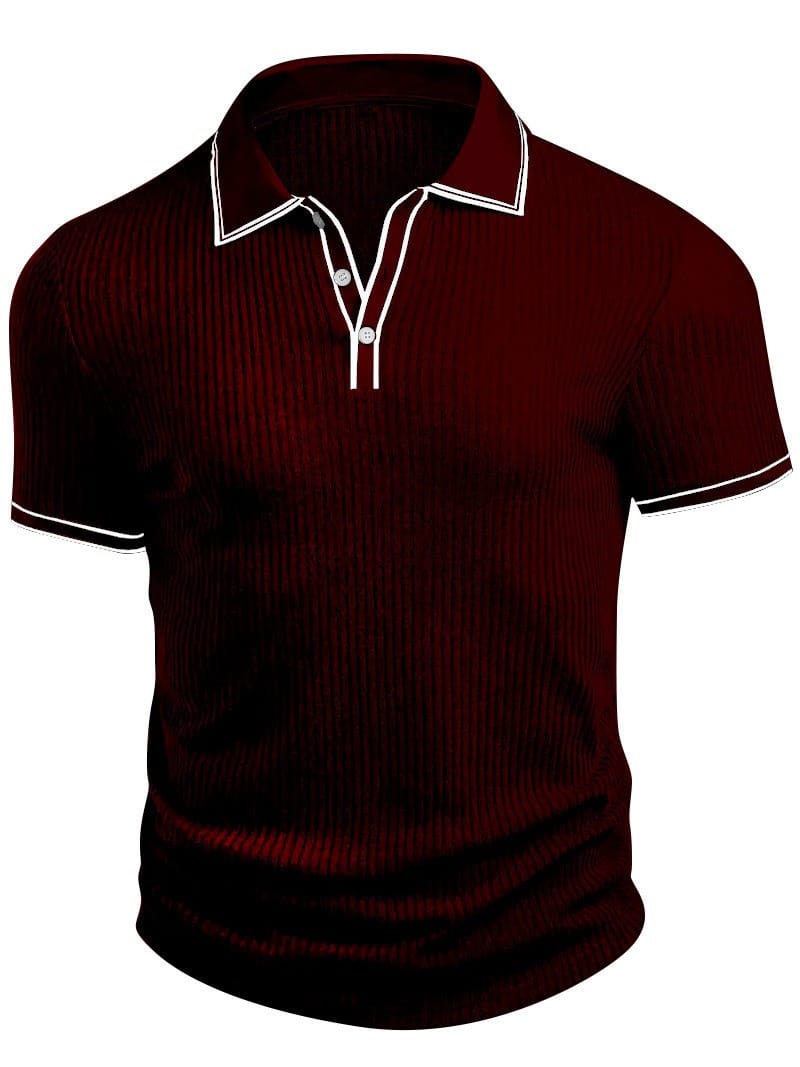 Detail van de mouw met ribstructuur van het donkerblauwe geribbelde gebreide poloshirt, perfect afgewerkt.